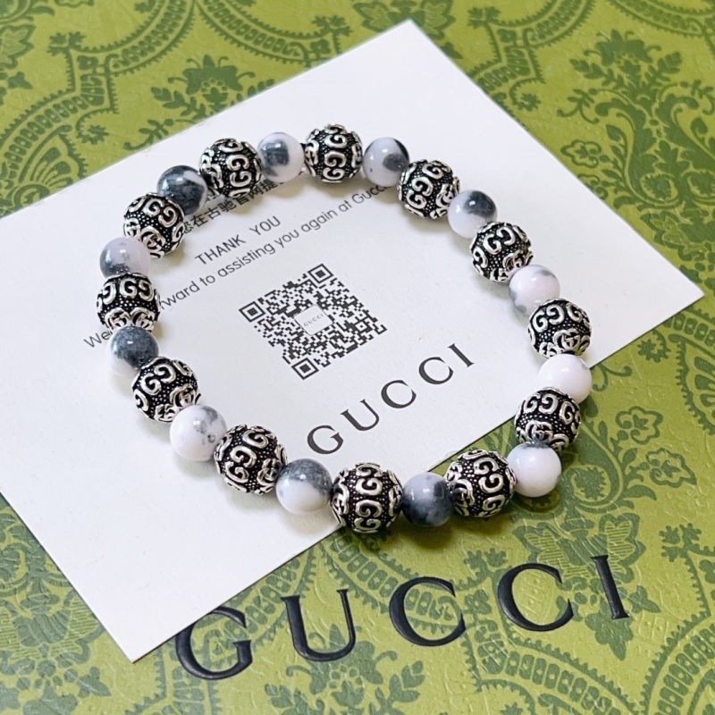 G*u*i bracelets